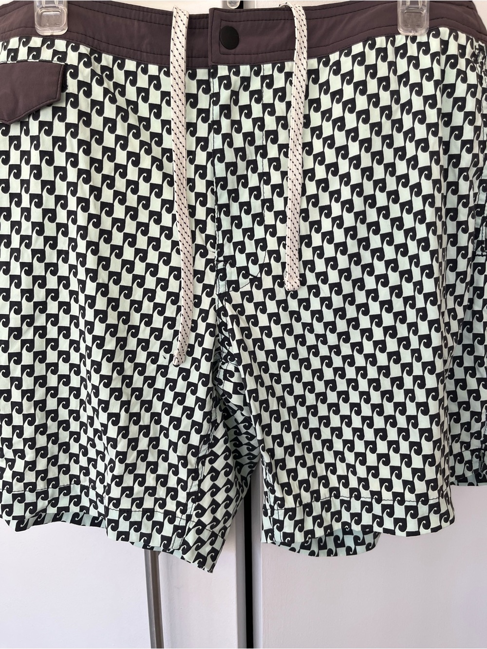 J. Crew men’s swim trunks size 32”W X7”L. Grey pattern.